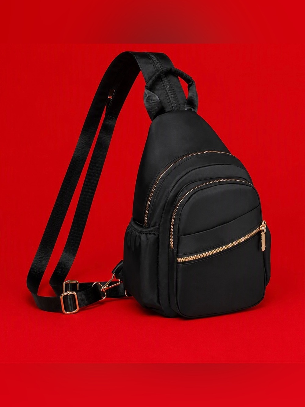 Black Nylon Sling Backpack with Gold Zippers